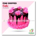 Pink Dripped Cake with White Sprinkles