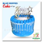 Blue Dripped Cake with Topper